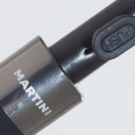 Martini engraving on gun metal neck ring