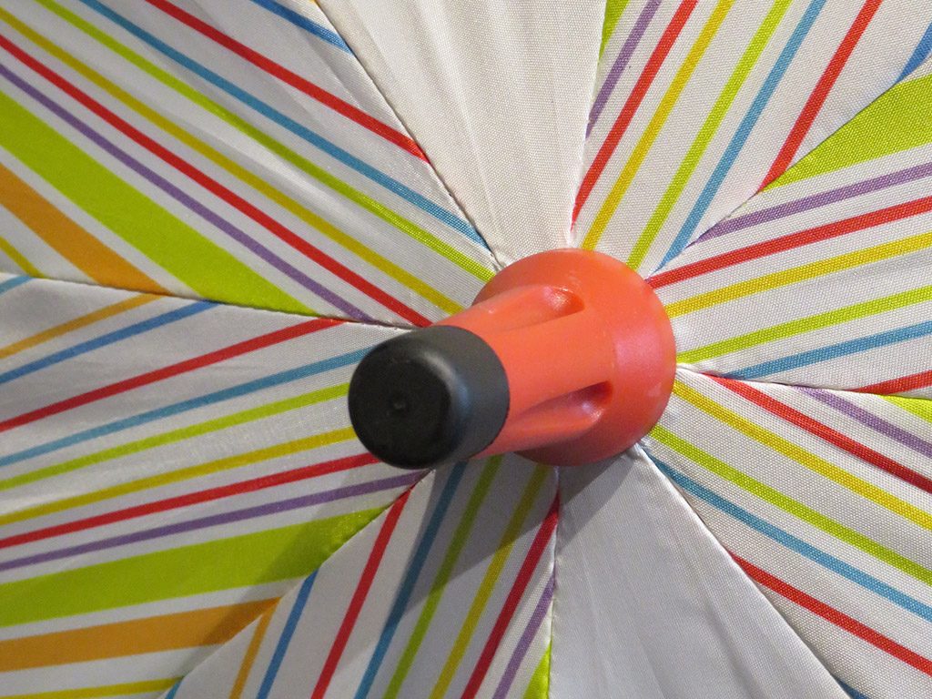 Black and red tip of umbrellas