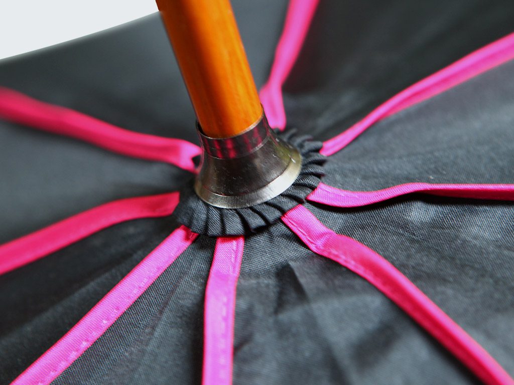 pink-perimeter-tape-close-up-on-umbrella