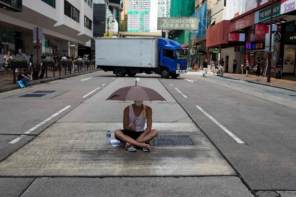 Man with Umbrella in Hong Kong
