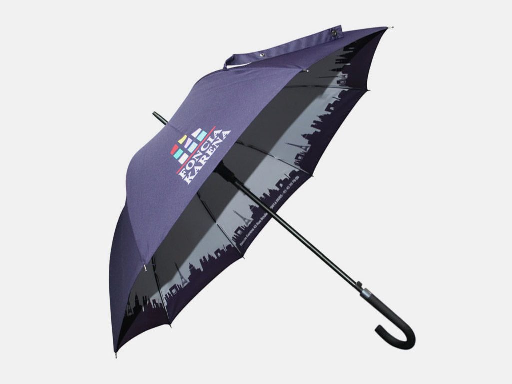 Nylon umbrella printed with the logo on a brown backgrou…
