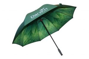 green canopy with digitally printed leaf image on underside of branded umbrella