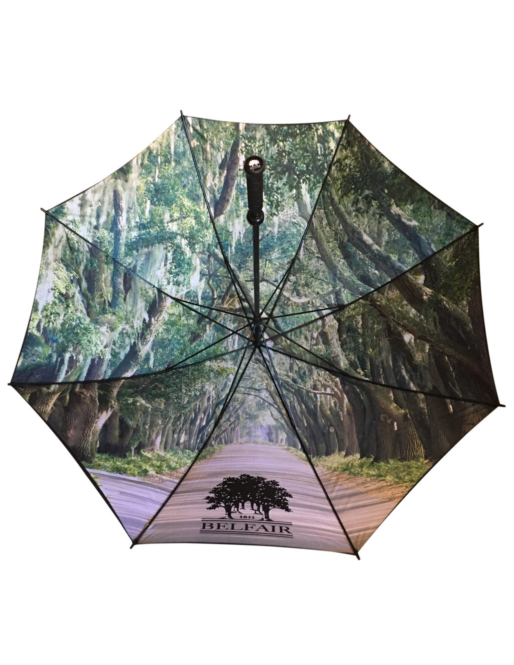 digitally printed tree arch on underside of branded umbrella