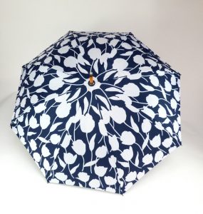 navy and white floral graphic on wood walker umbrella