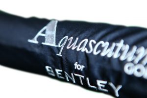 black and white branded embroidered umbrella sleeve