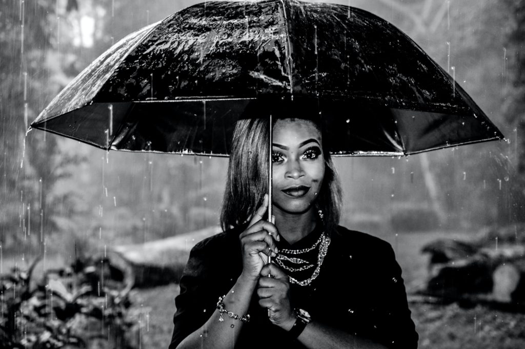 Umbrella facts woman holding umbrella in rain