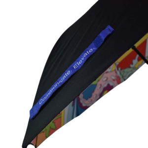 printed purple tie wrap on black panels of umbrella