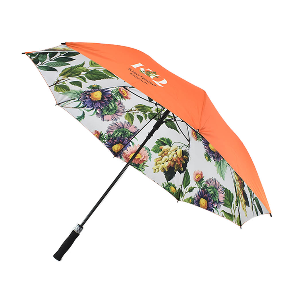 Floral canopy umbrella with orange outer canopy