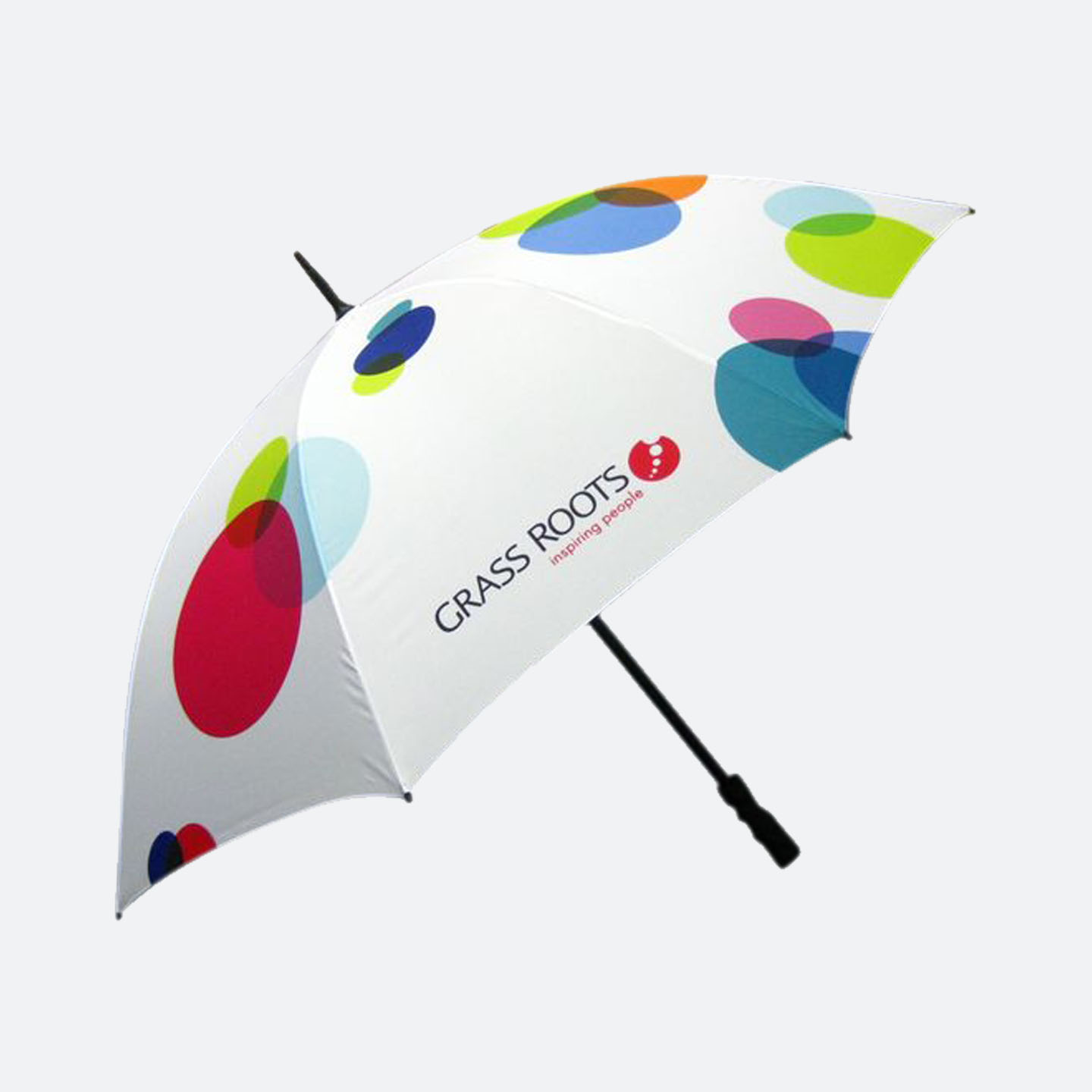 White umbrella with multi-coloured circle pattern