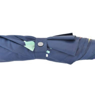 closed umbrella with popper closure on tie wrap