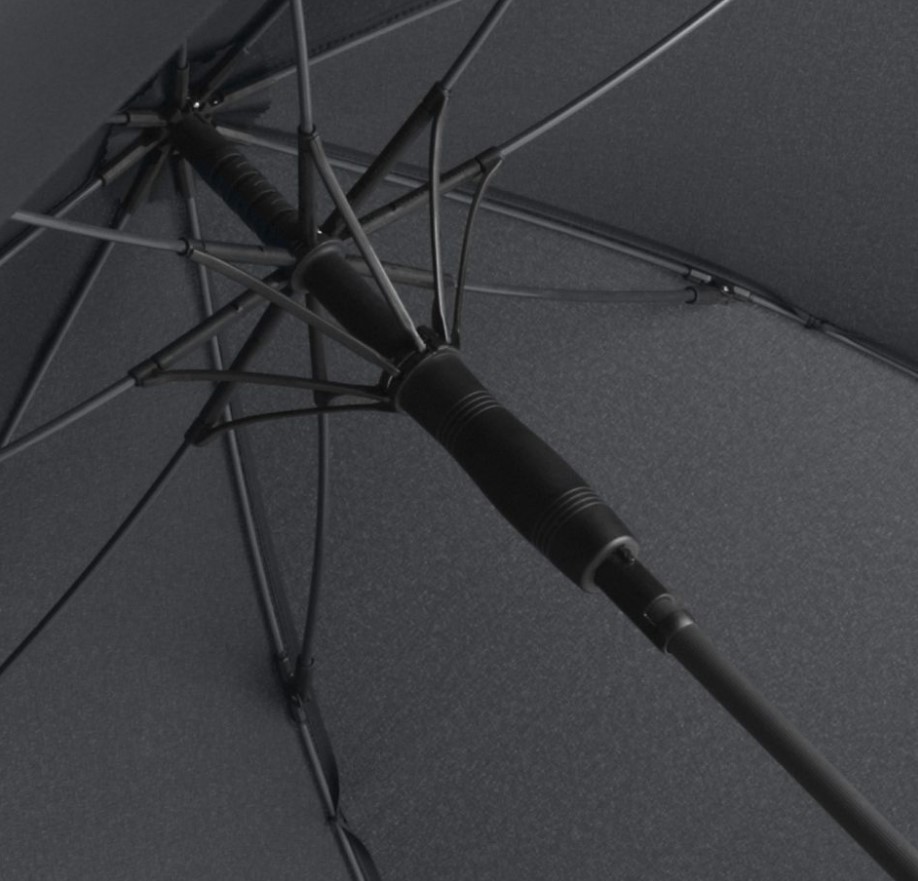 inside of black panel umbrella showing black umbrella frame and pole