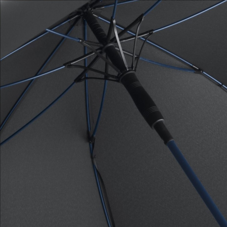 inside of black panel umbrella showing navy umbrella frame and pole