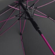 inside of black panel umbrella showing hot pink umbrella frame