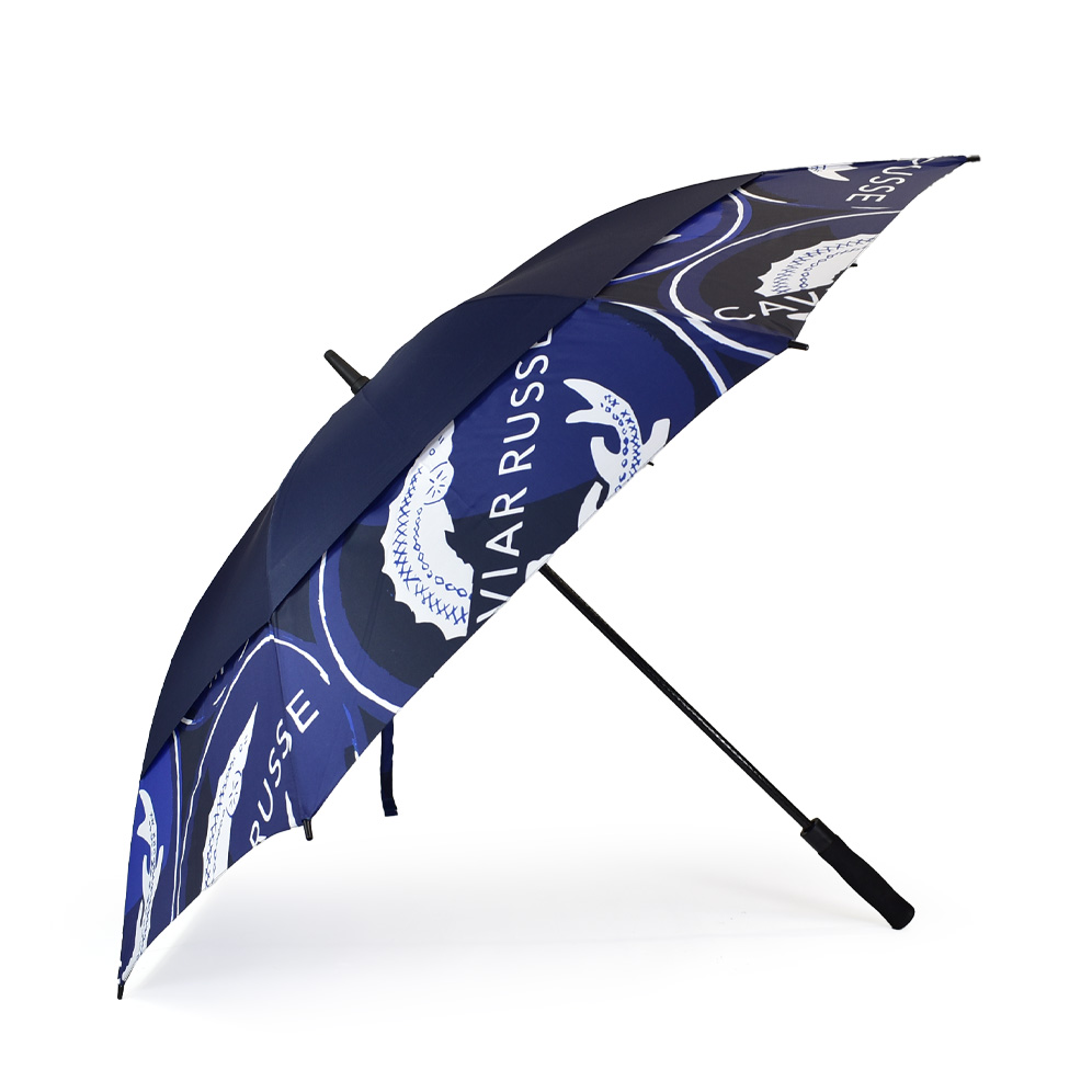 side view of golf umbrella with vented panels in bright blue