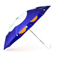 side view of umbrella with blue and white showing of the flower print