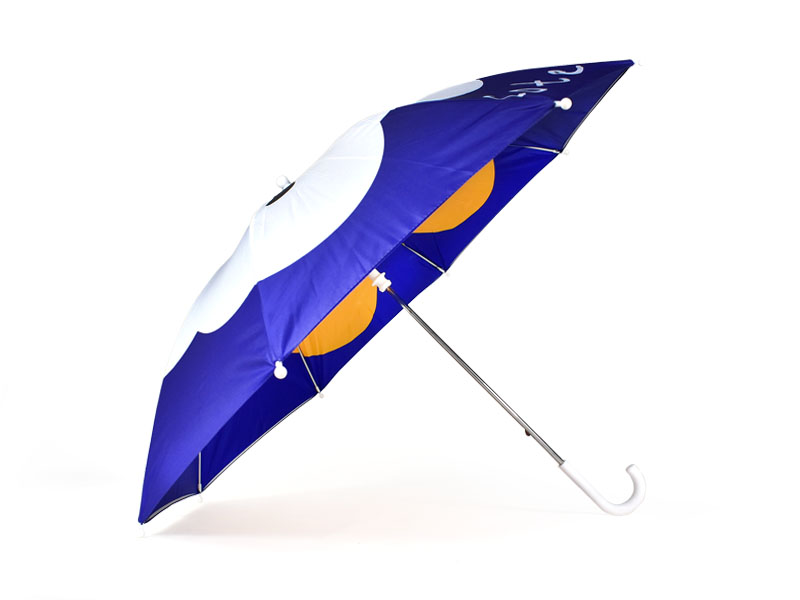 side view of umbrella with blue and white showing of the flower print