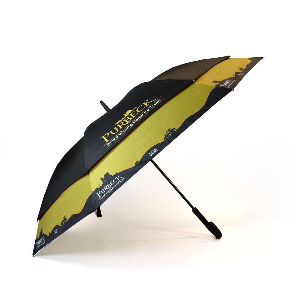 skyline umbrella vented umbrella printed yellow and black with skyline around the bottom of the umbrella panels