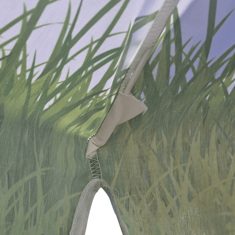 digital print of grass shown on outside of classic garden parasol with white steel rib