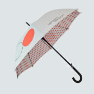 Derwent umbrella with logo print on outside of umbrella and polka dot pattern on inside of umbrella