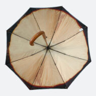 artist’s illustration printed on umbrella shows open umbrella with inside of mushroom printed on inside of umbrella