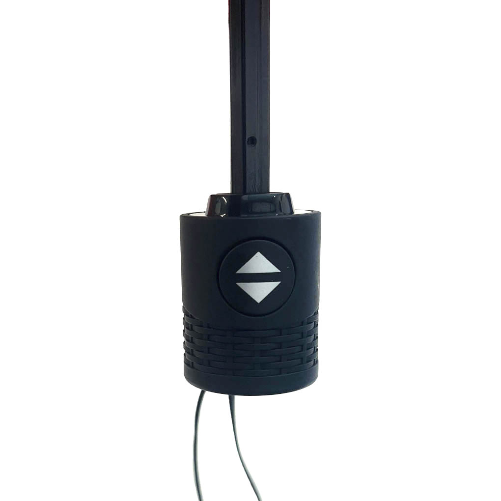 black close up of palm held handle on umbrella with push button