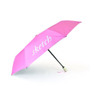 side view of open pink folding umbrella