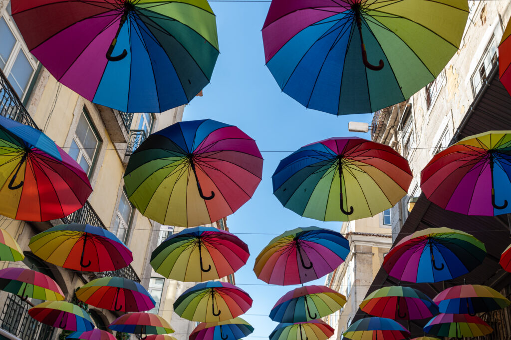 umbrellas above a street