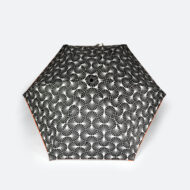 top view of printed black and white umbrella with orange tape for C-suite luxury branded merchandise