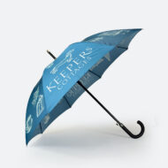 side view of city walker umbrella with black curved handle and blue panels