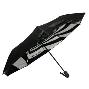 side view of umbrella with black outside panels and silver and black on the inside