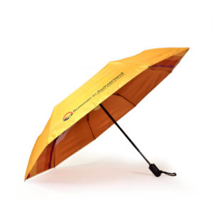 Bespoke school branding side view of Leysin American School open umbrella in yellow with digital print on inside panels