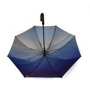 umbrella for Leysin American School in black outer panels with print on inside
