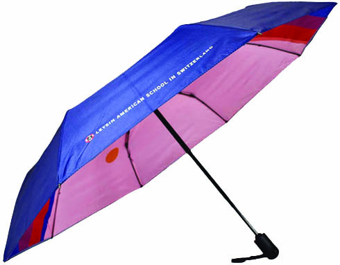 open side view of folding umbrella with blue panels and pink inside